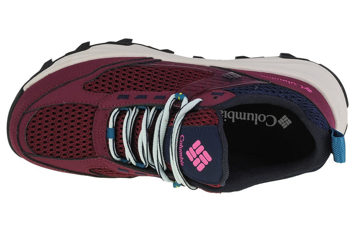 Zapato deportivo Columbia color marionberry con malla transpirable y cordones azul claro.