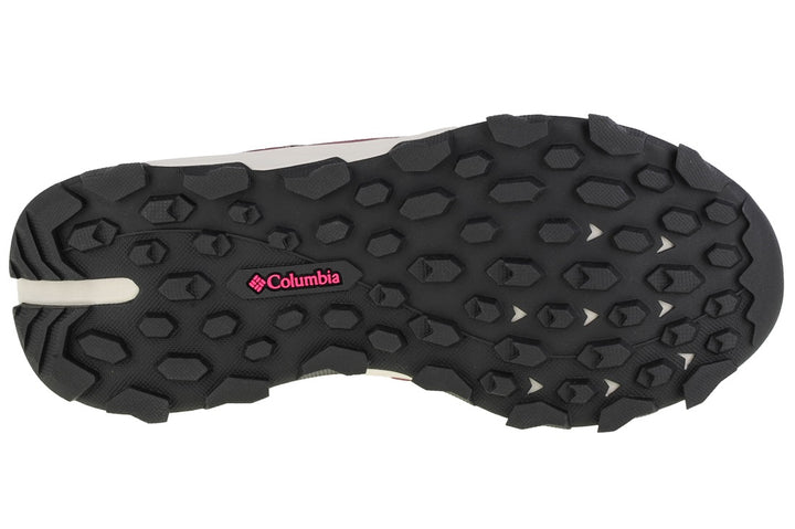 Zapato deportivo Columbia color marionberry con malla transpirable y cordones azul claro.