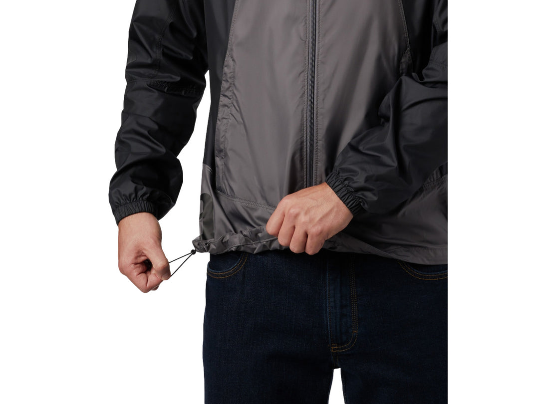 Chaqueta rompevientos Columbia bicolor en gris y negro con capucha y cierre frontal.