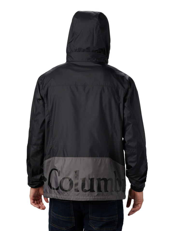 Chaqueta rompevientos Columbia bicolor en gris y negro con capucha y cierre frontal.