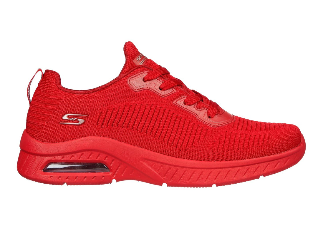 Tenis deportivos Skechers color rojo con amortiguación de aire en el talón y tejido transpirable.