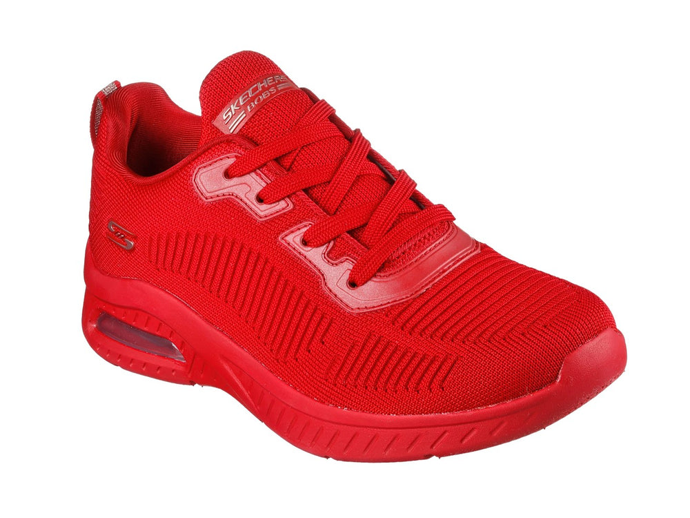 Tenis deportivos Skechers color rojo con amortiguación de aire en el talón y tejido transpirable.