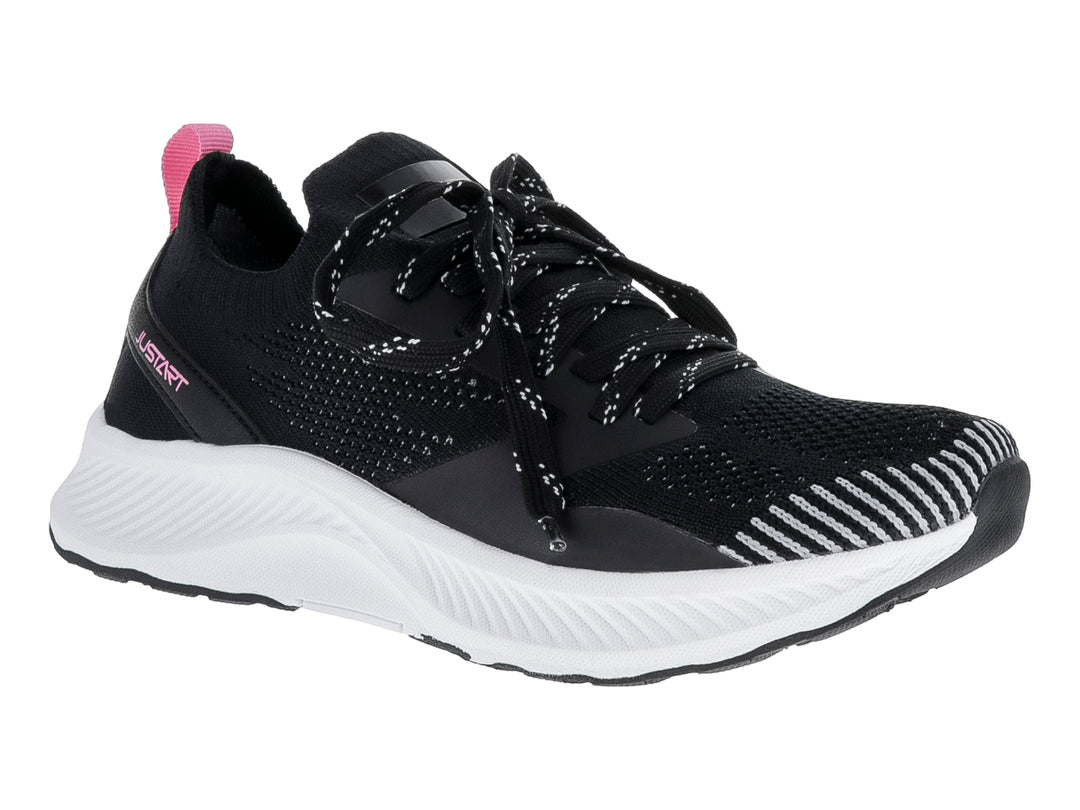 Tenis deportivos Justart en color negro con suela blanca y detalle rosa en la lengüeta.