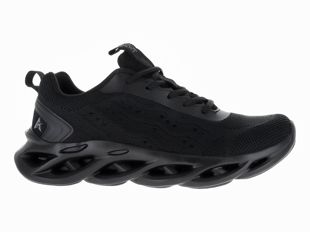 Tenis de baloncesto JUSTART color negro con suela ondulada y diseño futurista.