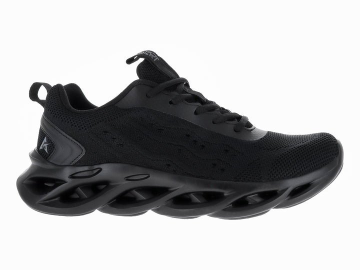 Tenis de baloncesto JUSTART color negro con suela ondulada y diseño futurista.