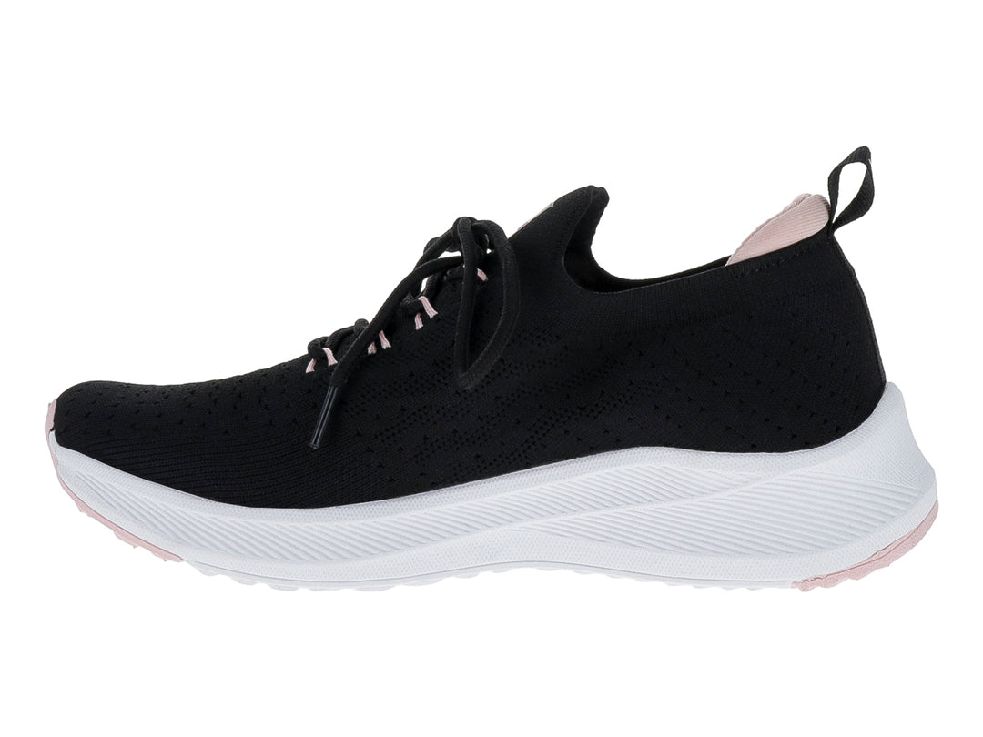 Tenis deportivos JUSTART color negro con suela blanca y detalles en rosa.