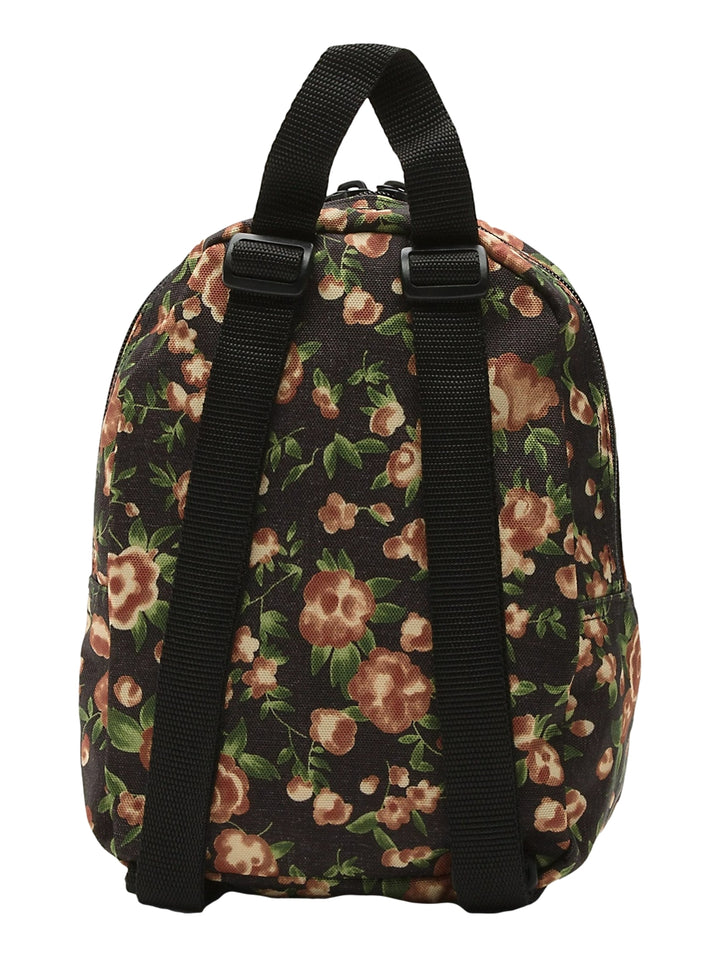 Mini mochila Vans de color negro con estampado floral en tonos marrón y verde.