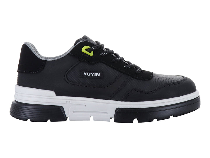 Tenis infantiles YUYIN color negro con suela blanca y detalles en verde lima.