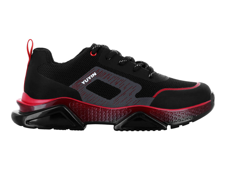 Tenis deportivos infantiles color negro con detalles en rojo y suela gruesa texturizada.