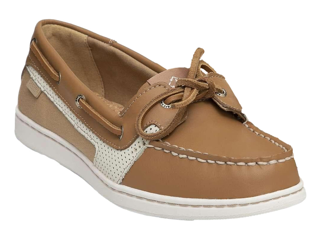 Zapato náutico Sperry de cuero color tan con detalles perforados blancos y suela blanca.