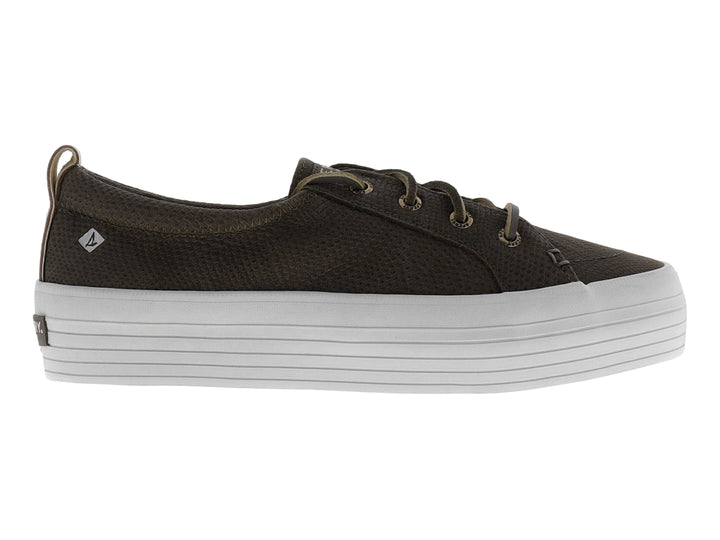 Zapato Sperry verde con textura de piel de serpiente y suela blanca de plataforma alta.