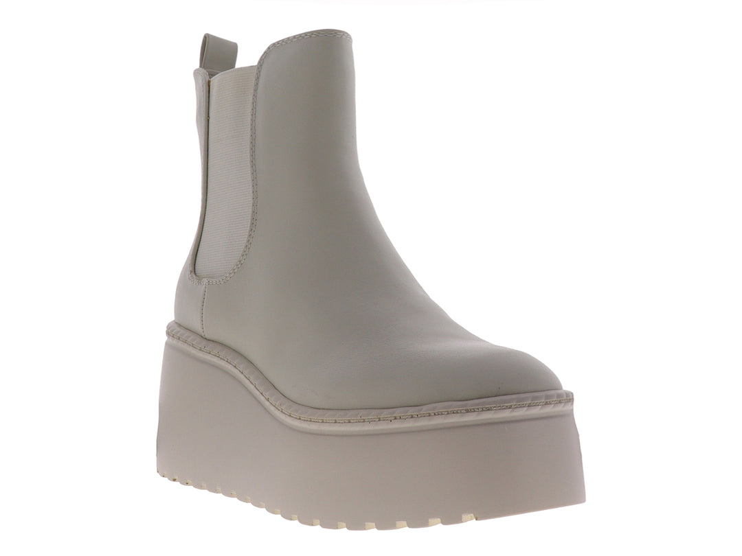 Botín casual Nine West color beige con plataforma alta y suela track.