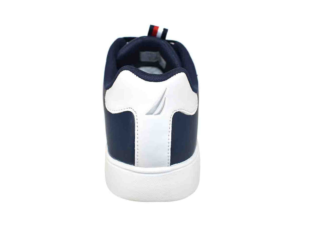 Tenis Nautica color azul marino con suela blanca y detalles blancos en el talón.