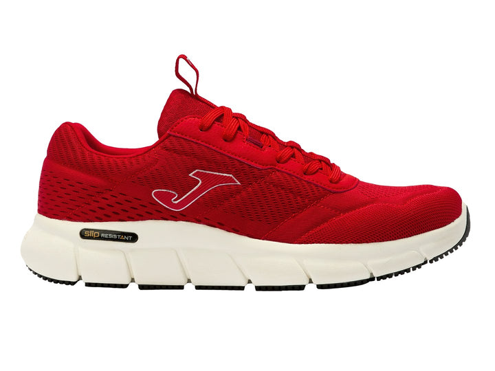 Tenis deportivos Joma de color rojo con suela blanca y detalles en negro.