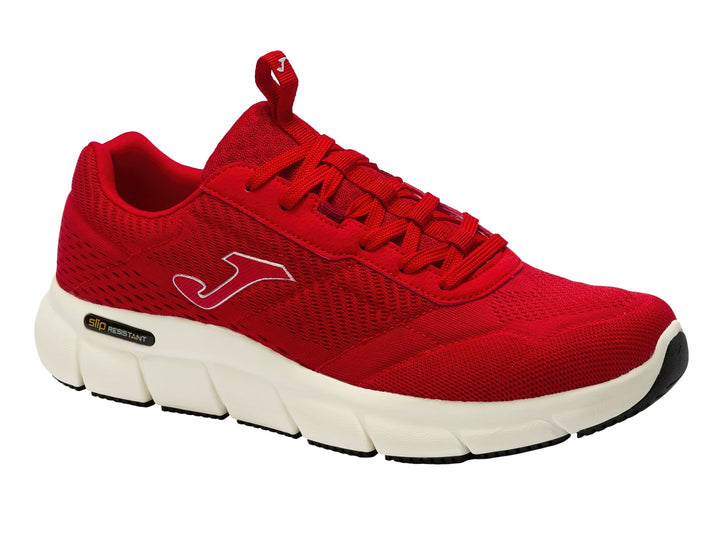 Tenis deportivos Joma de color rojo con suela blanca y detalles en negro.