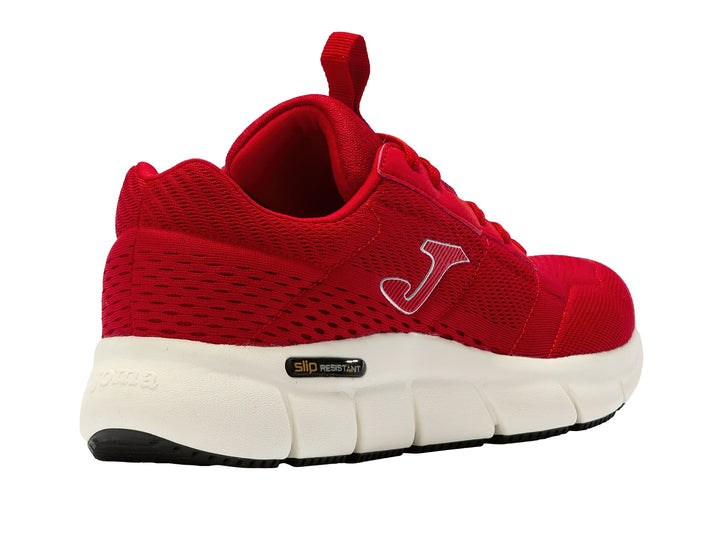 Tenis deportivos Joma de color rojo con suela blanca y detalles en negro.