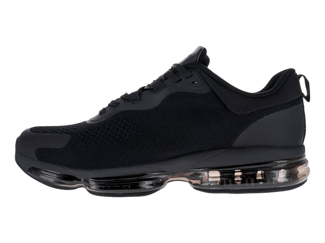 Tenis de baloncesto JUSTART color negro con suela transparente y tejido de malla.