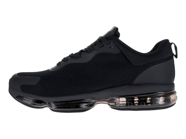 Tenis de baloncesto JUSTART color negro con suela transparente y tejido de malla.