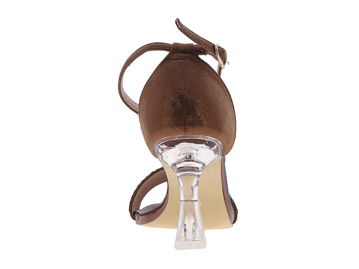Sandalia color bronce para mujer con tacón transparente y correa frontal decorada con cristales brillantes.