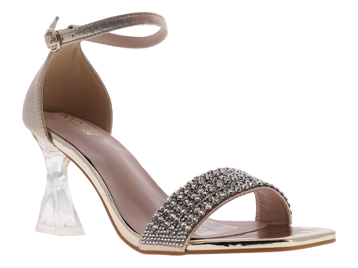 Sandalia dorada para mujer con tacón transparente y correa frontal decorada con pedrería brillante.