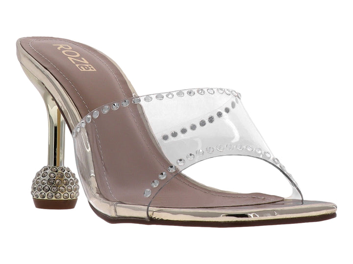 Sandalia de tacón alto dorado con tira transparente adornada con cristales y base de tacón esférica.