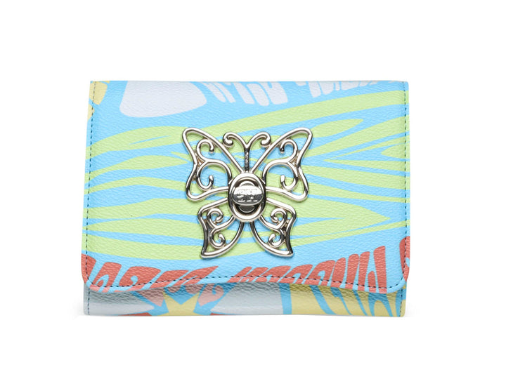 Cartera Steve Madden con estampado floral en tonos azul, amarillo y rosa.