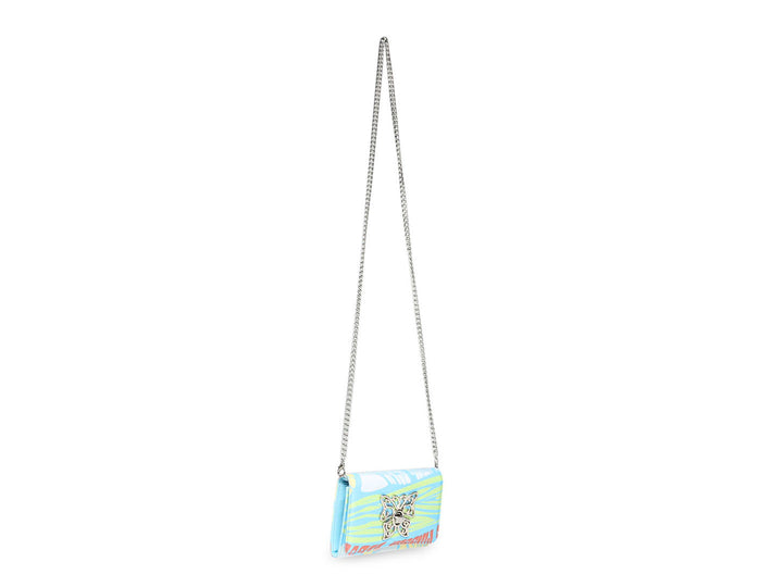 Cartera Steve Madden con estampado floral en tonos azul, amarillo y rosa.