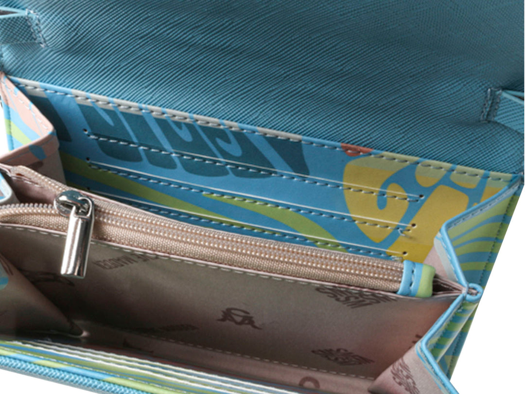 Cartera Steve Madden con estampado floral en tonos azul, amarillo y rosa.