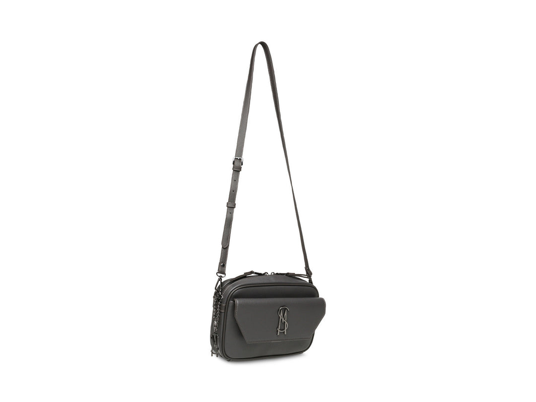 Bolso bandolera color gris oscuro de Steve Madden con correa ajustable y pequeño monedero circular.