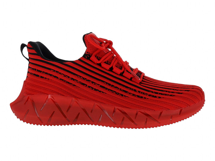 Tenis deportivos rojos con rayas negras y suela gruesa esculpida.