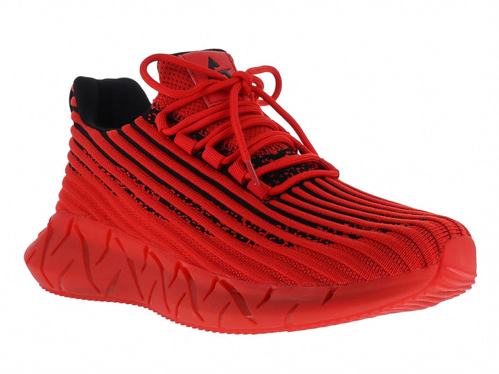 Tenis deportivos rojos con rayas negras y suela gruesa esculpida.
