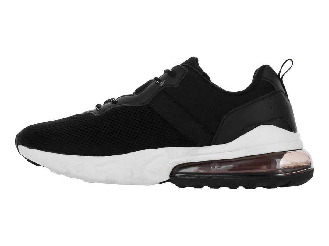 Tenis deportivos Justart color negro con suela blanca y amortiguación de aire en el talón.