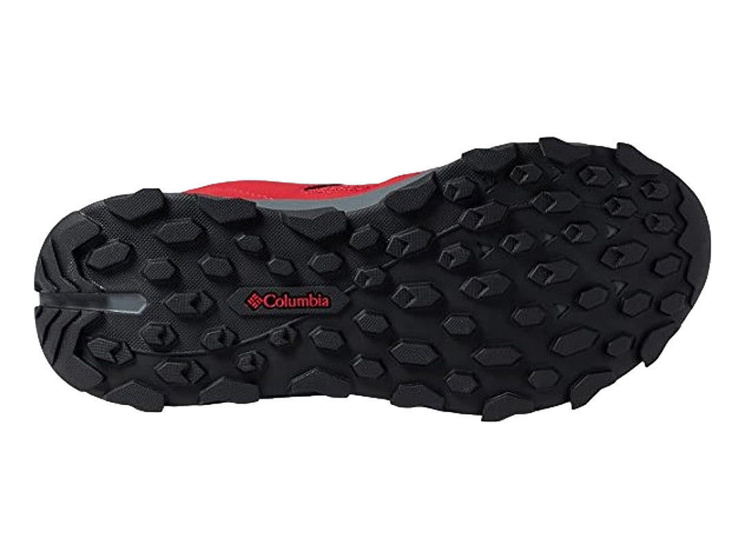 Par de tenis deportivos Columbia color rojo con suela gris oscuro y detalles azules.