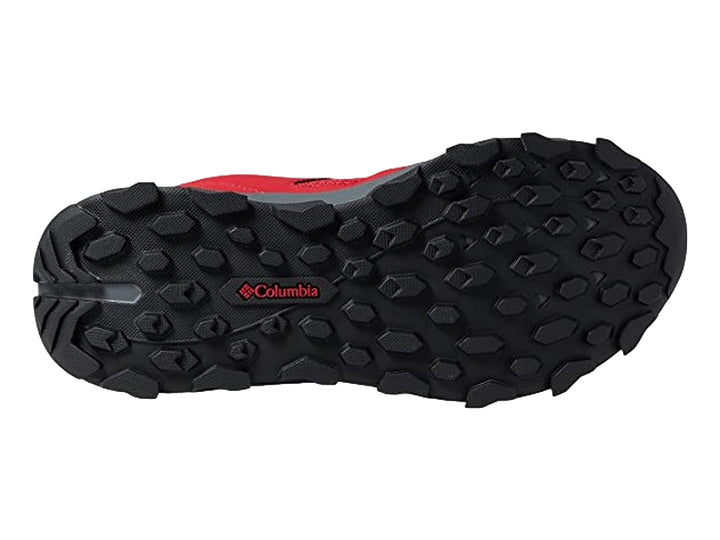 Par de tenis deportivos Columbia color rojo con suela gris oscuro y detalles azules.