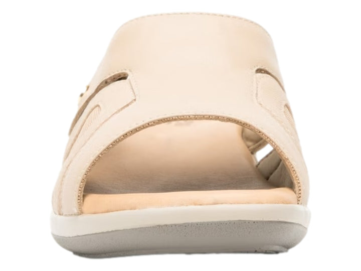 Sandalia Flexi color beige para mujer con tiras de cuero y detalles de malla transpirable.