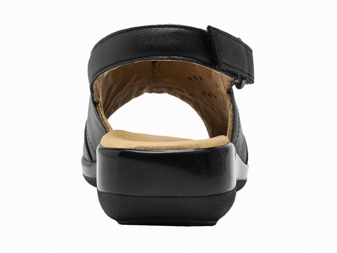 Sandalia Flexi para mujer en color negro con correa ajustable y plantilla beige.