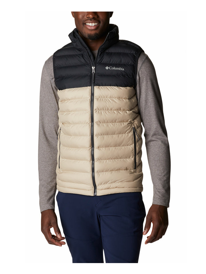Chaleco acolchado Columbia bicolor en negro y beige para hombre.