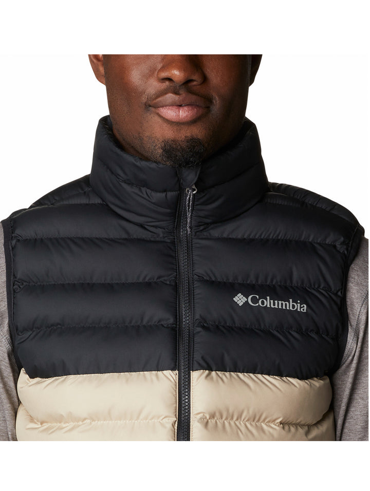 Chaleco acolchado Columbia bicolor en negro y beige para hombre.