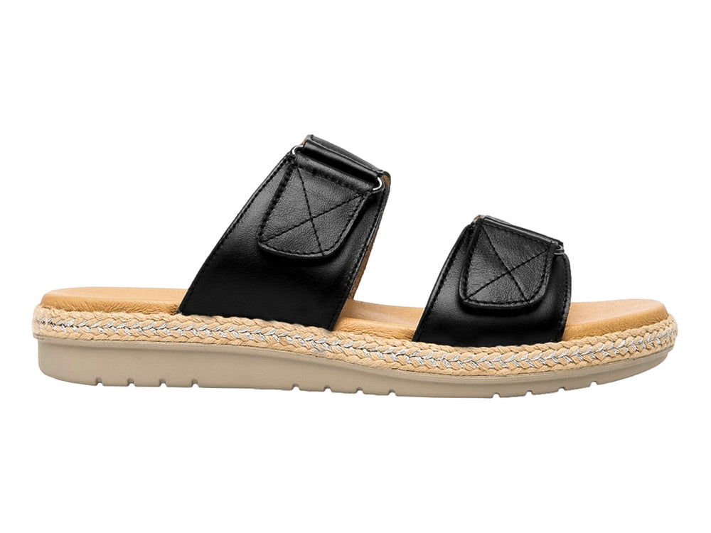Sandalia Flexi de cuero negro con dos correas ajustables y suela con detalle de cuerda beige.