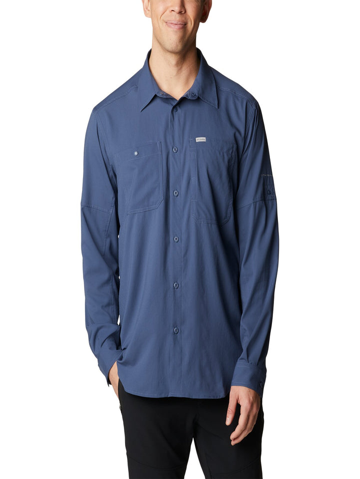 Camisa Columbia de manga larga en color azul oscuro con cuello y botones frontales.