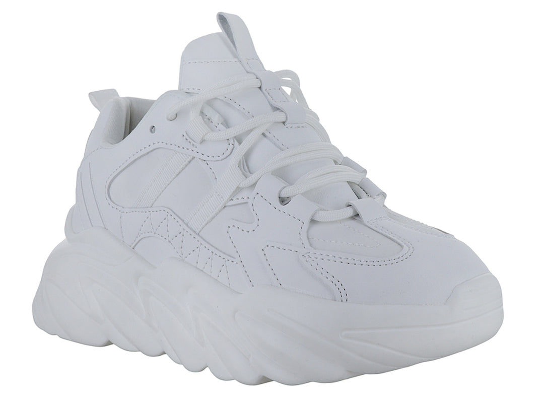 Tenis blancos de plataforma con suela ondulada y diseño moderno.