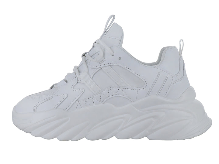 Tenis blancos de plataforma con suela ondulada y diseño moderno.