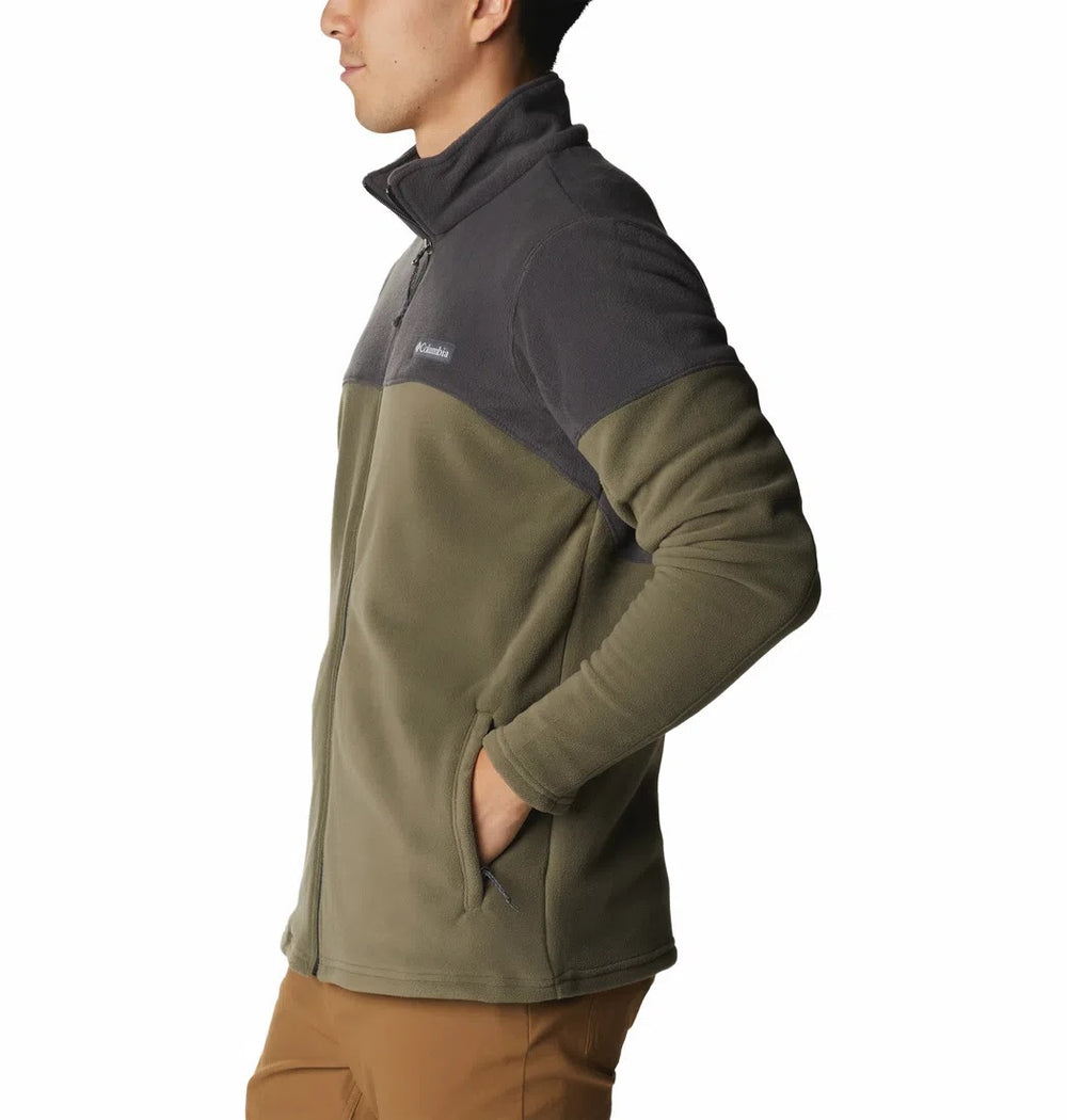 Chaqueta Columbia bicolor en tonos verde oliva y gris oscuro con cierre frontal.