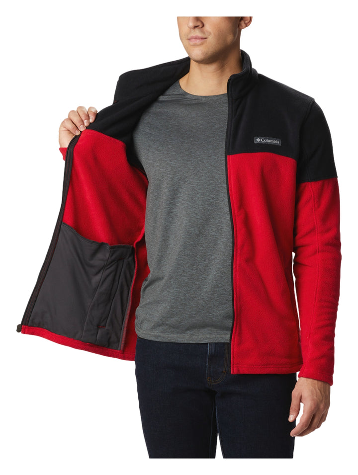 Chaqueta polar Columbia en colores rojo y negro con cierre frontal completo.