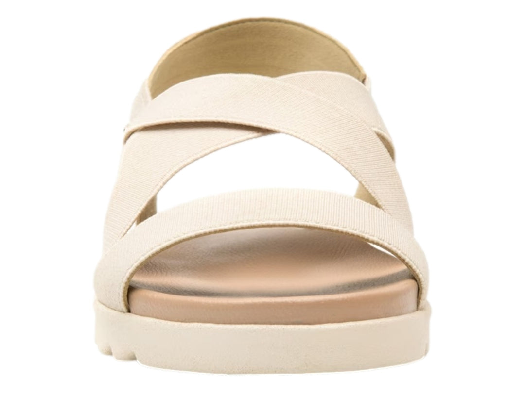 Sandalia Flexi para mujer en color beige con correas textiles cruzadas y suela blanca ondulada.