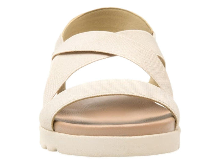Sandalia Flexi para mujer en color beige con correas textiles cruzadas y suela blanca ondulada.