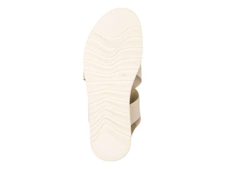 Sandalia Flexi para mujer en color beige con correas textiles cruzadas y suela blanca ondulada.