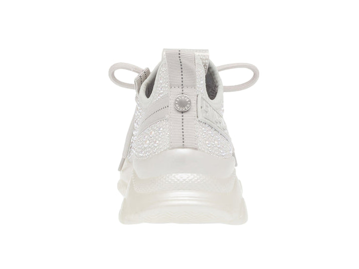 Tenis Steve Madden Mistic color blanco iridiscente con detalles brillantes y suela de plataforma gruesa.