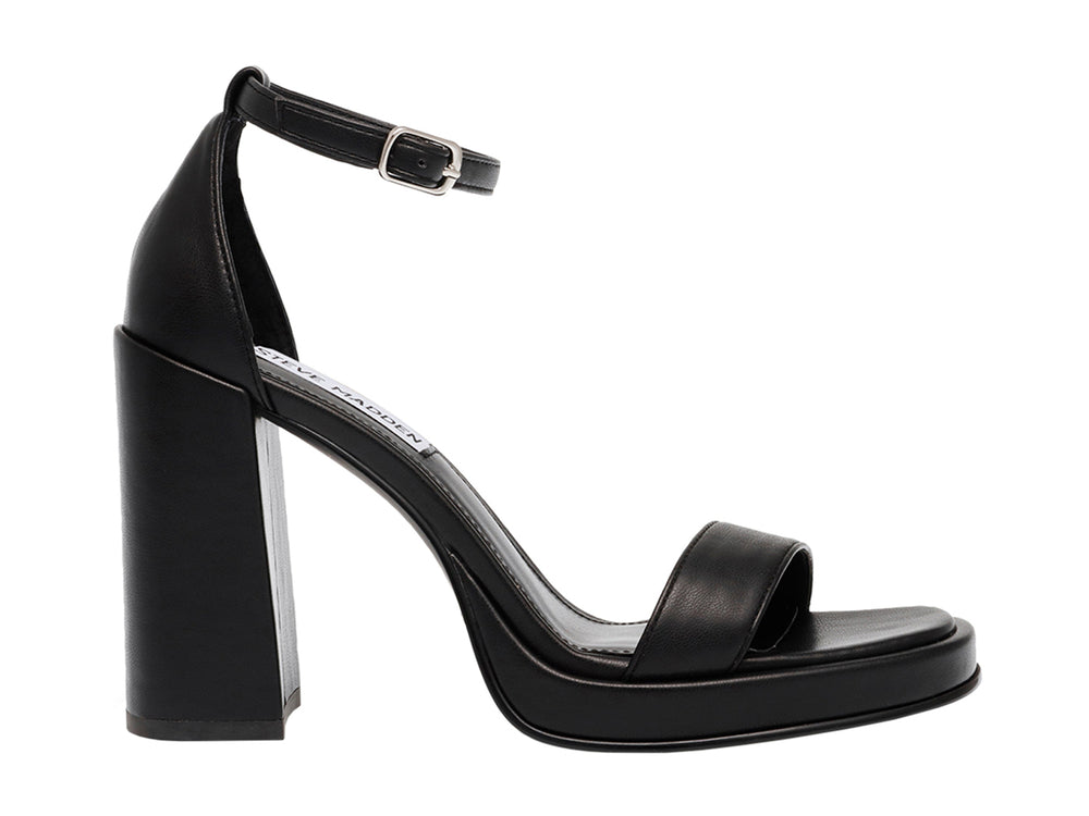 Sandalia negra de tacón grueso y plataforma con correa al tobillo de Steve Madden.