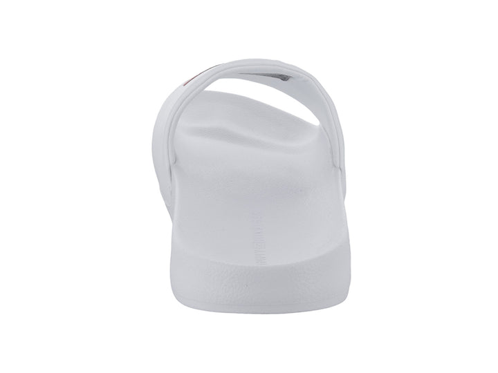Sandalia deslizable Tommy Hilfiger de color blanco con logotipo en la banda superior.